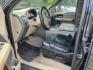 2005 BLACK FORD F-150 Lariat SuperCrew 2WD (1FTPW12535K) with an 5.4L V6 SOHC 16V engine, AUTOMATIC transmission, located at 2303 West Mt. Houston, Houston, 77038, (281) 507-3956, 29.771597, -95.339569- Photo#2