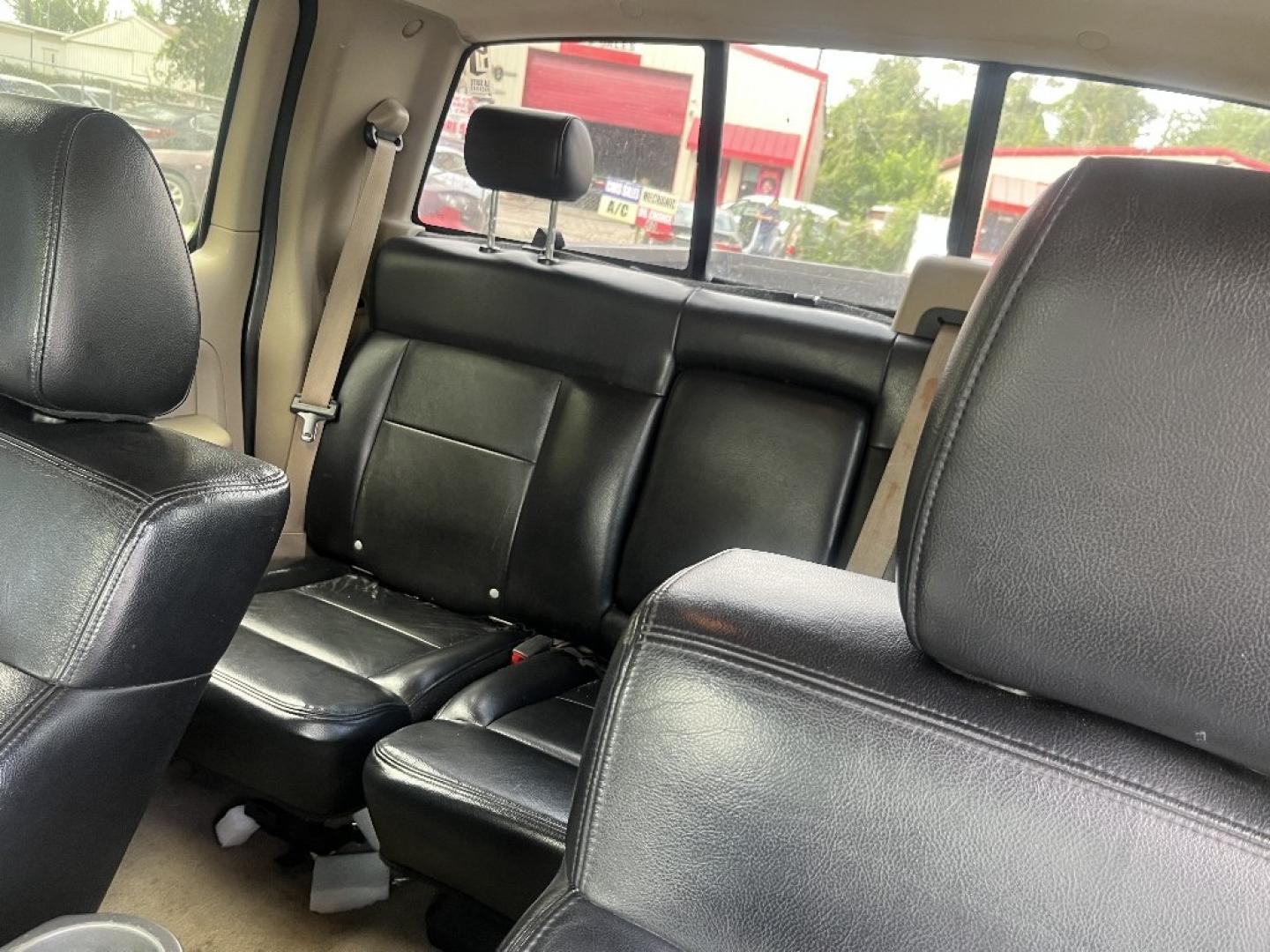2005 BLACK FORD F-150 Lariat SuperCrew 2WD (1FTPW12535K) with an 5.4L V6 SOHC 16V engine, AUTOMATIC transmission, located at 2303 West Mt. Houston, Houston, 77038, (281) 507-3956, 29.771597, -95.339569- Photo#4