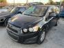 2013 BLACK /BROWN CHEVROLET SONIC LT Auto Sedan (1G1JC5SH5D4) with an 1.8L L4 DOHC 24V engine, AUTOMATIC transmission, located at 2303 West Mt. Houston, Houston, 77038, (281) 507-3956, 29.771597, -95.339569- Photo#0