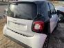 2016 WHITE /BLACK SMART FORTWO passion coupe (WMEFJ5DA4GK) with an 1.0L L3 DOHC 12V engine, AUTOMATIC transmission, located at 2303 West Mt. Houston, Houston, 77038, (281) 507-3956, 29.771597, -95.339569- Photo#1