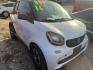 2016 WHITE /BLACK SMART FORTWO passion coupe (WMEFJ5DA4GK) with an 1.0L L3 DOHC 12V engine, AUTOMATIC transmission, located at 2303 West Mt. Houston, Houston, 77038, (281) 507-3956, 29.771597, -95.339569- Photo#2