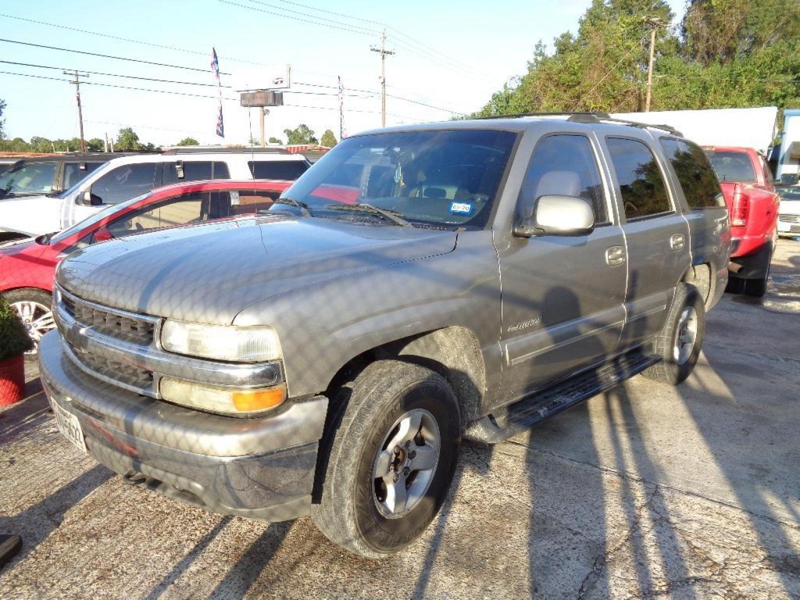 2001 TAN CHEVROLET TAHOE 2WD (1GNEC13TX1R) with an 5.3L V8 OHV 16V engine, AUTOMATIC transmission, located at 2303 West Mt. Houston, Houston, Texas, 77038, (281) 507-3956, 29.771597, -95.339569 - Photo #0