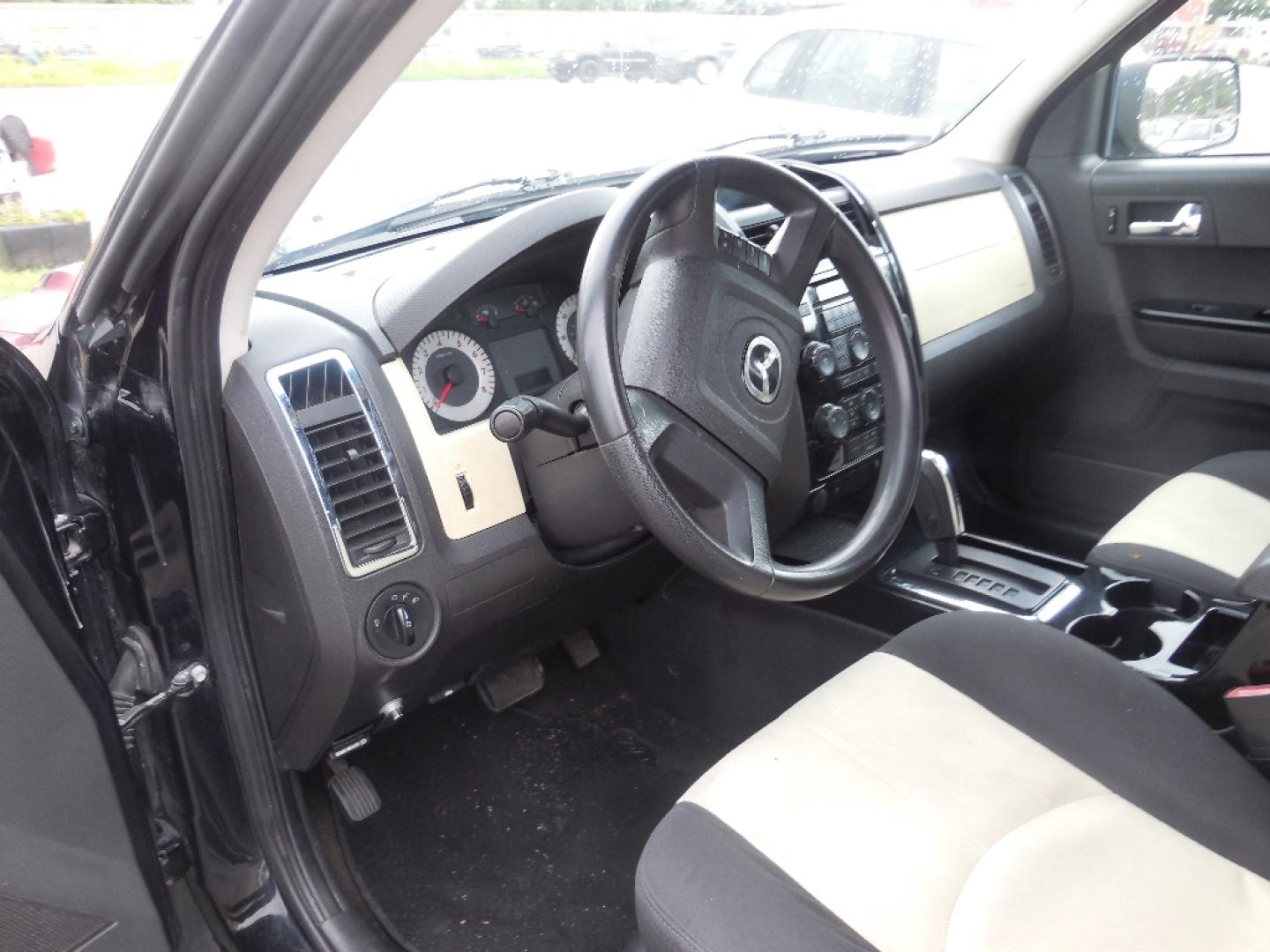 2008 BLACK MAZDA TRIBUTE s Grand Touring FWD (4F2CZ06128K) with an 3.0L V6 DOHC 24V engine, AUTOMATIC transmission, located at 2303 West Mt. Houston, Houston, 77038, (281) 507-3956, 29.771597, -95.339569- Photo#2
