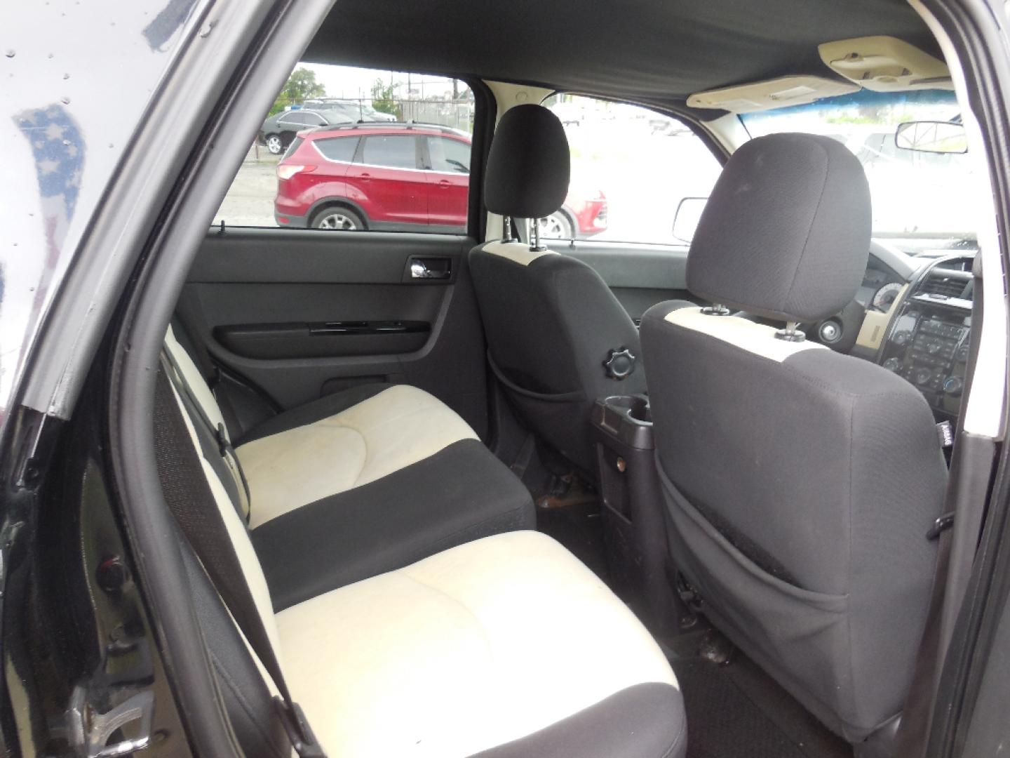 2008 BLACK MAZDA TRIBUTE s Grand Touring FWD (4F2CZ06128K) with an 3.0L V6 DOHC 24V engine, AUTOMATIC transmission, located at 2303 West Mt. Houston, Houston, 77038, (281) 507-3956, 29.771597, -95.339569- Photo#3