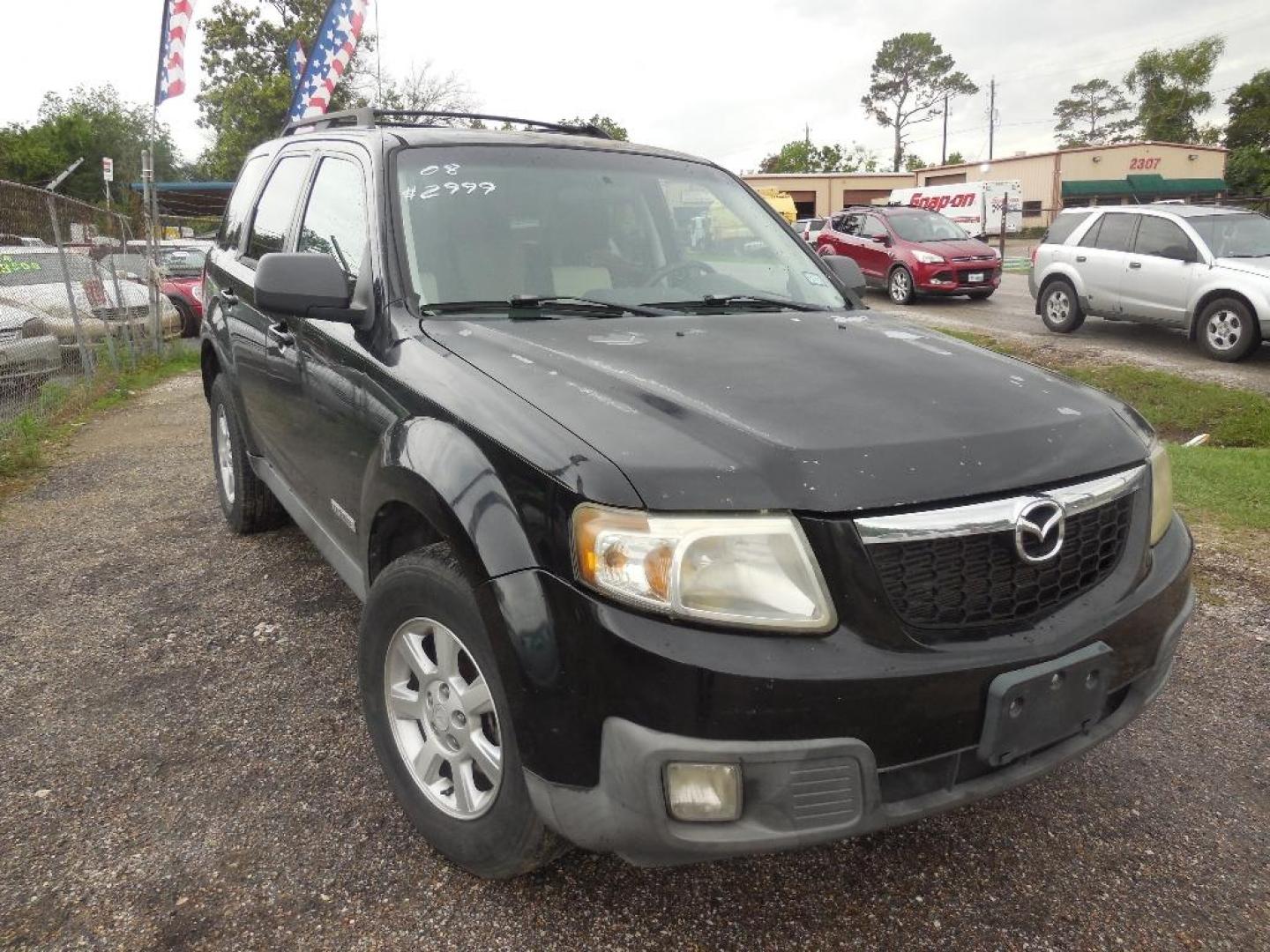 2008 BLACK MAZDA TRIBUTE s Grand Touring FWD (4F2CZ06128K) with an 3.0L V6 DOHC 24V engine, AUTOMATIC transmission, located at 2303 West Mt. Houston, Houston, 77038, (281) 507-3956, 29.771597, -95.339569 - Photo#0