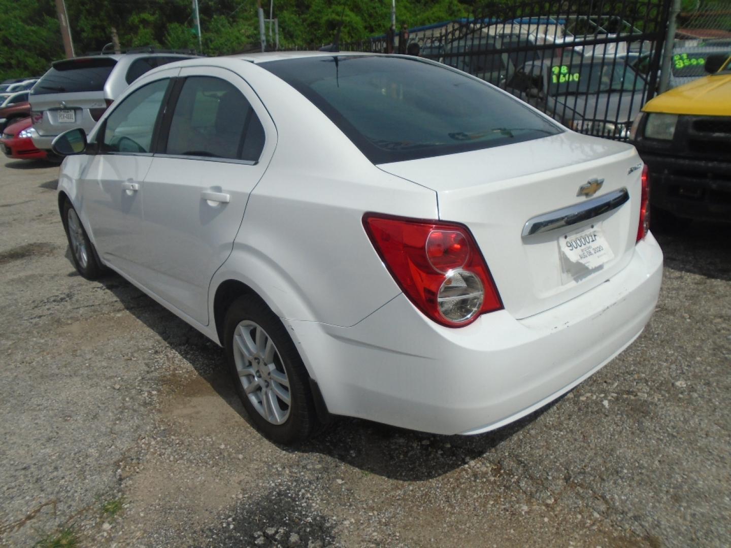 2012 WHITE CHEVROLET SONIC 2LT Sedan (1G1JC5SH9C4) with an 1.8L L4 DOHC 24V engine, AUTOMATIC transmission, located at 2303 West Mt. Houston, Houston, 77038, (281) 507-3956, 29.771597, -95.339569- Photo#2