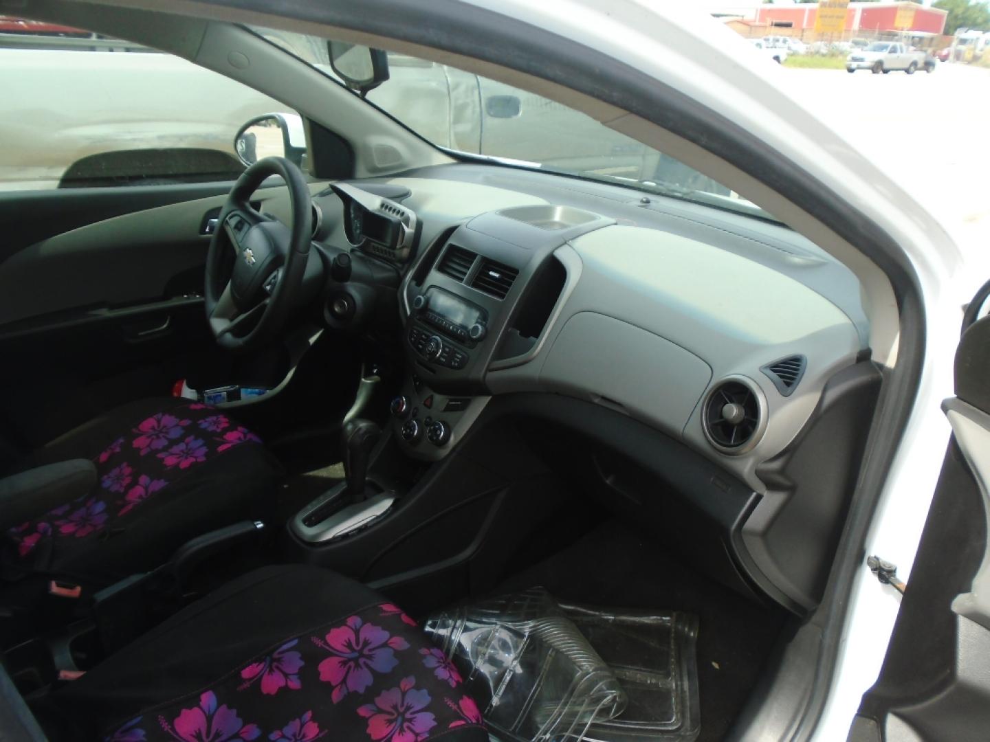 2012 WHITE CHEVROLET SONIC 2LT Sedan (1G1JC5SH9C4) with an 1.8L L4 DOHC 24V engine, AUTOMATIC transmission, located at 2303 West Mt. Houston, Houston, 77038, (281) 507-3956, 29.771597, -95.339569- Photo#4