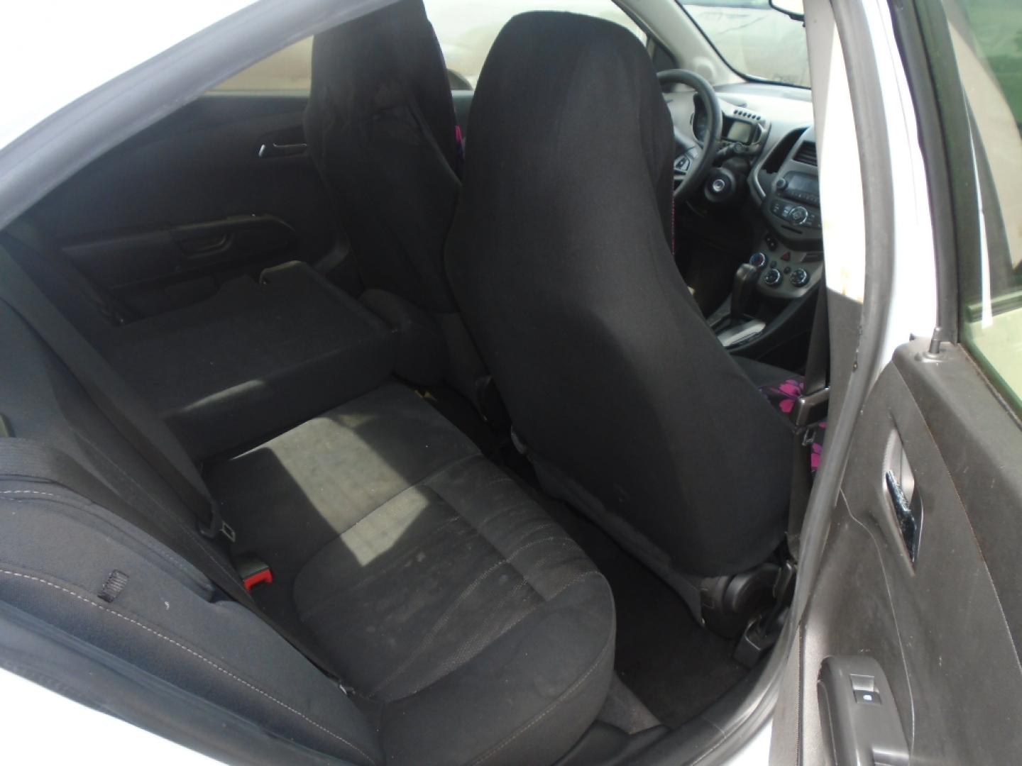 2012 WHITE CHEVROLET SONIC 2LT Sedan (1G1JC5SH9C4) with an 1.8L L4 DOHC 24V engine, AUTOMATIC transmission, located at 2303 West Mt. Houston, Houston, 77038, (281) 507-3956, 29.771597, -95.339569- Photo#5
