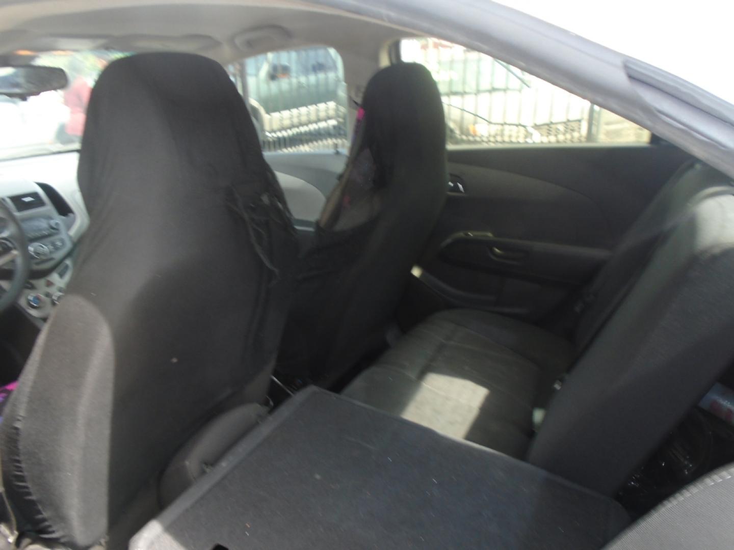2012 WHITE CHEVROLET SONIC 2LT Sedan (1G1JC5SH9C4) with an 1.8L L4 DOHC 24V engine, AUTOMATIC transmission, located at 2303 West Mt. Houston, Houston, 77038, (281) 507-3956, 29.771597, -95.339569- Photo#7