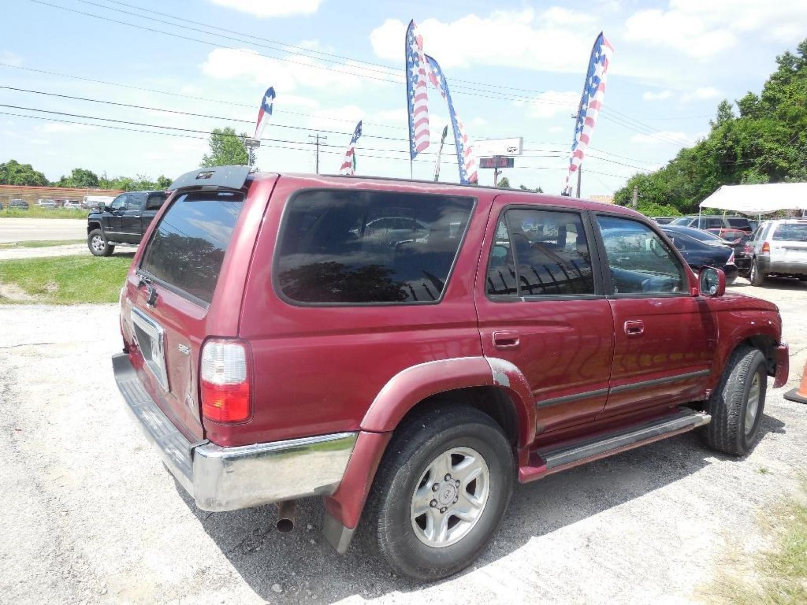 2002 RED TOYOTA 4RUNNER SR5 2WD (JT3GN86RX20) with an 3.4L V6 DOHC 24V engine, AUTOMATIC transmission, located at 2303 West Mt. Houston, Houston, Texas, 77038, (281) 507-3956, 29.771597, -95.339569 - Photo #1