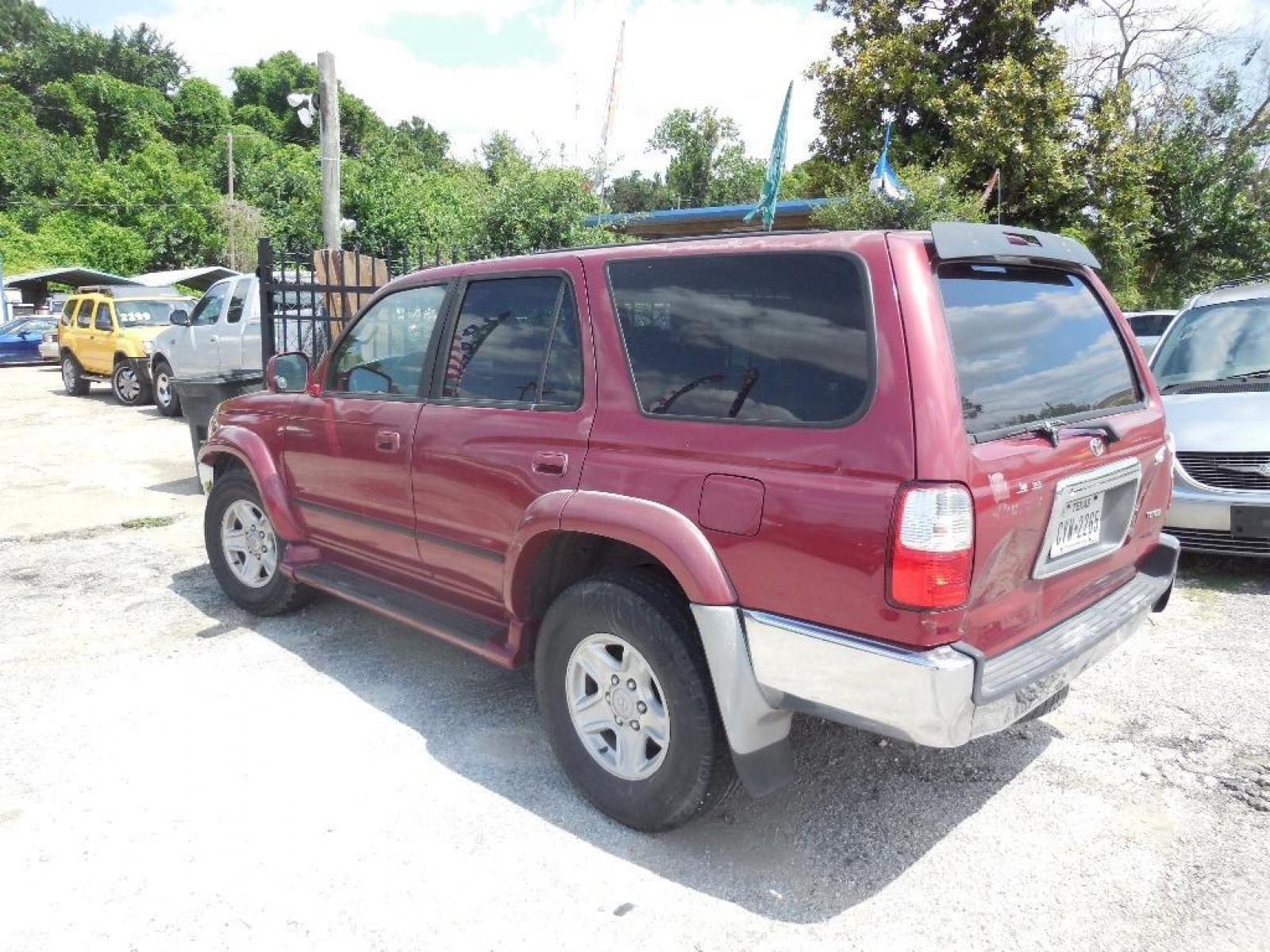 2002 RED TOYOTA 4RUNNER SR5 2WD (JT3GN86RX20) with an 3.4L V6 DOHC 24V engine, AUTOMATIC transmission, located at 2303 West Mt. Houston, Houston, Texas, 77038, (281) 507-3956, 29.771597, -95.339569 - Photo #2