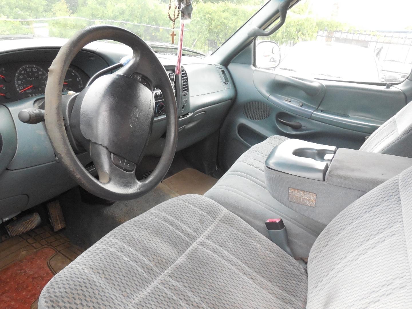 1997 WHITE FORD F-150 SuperCab Flareside Short Bed 2WD (1FTDX07W0VK) with an 4.6L V8 SOHC 16V engine, AUTOMATIC transmission, located at 2303 West Mt. Houston, Houston, 77038, (281) 507-3956, 29.771597, -95.339569- Photo#2