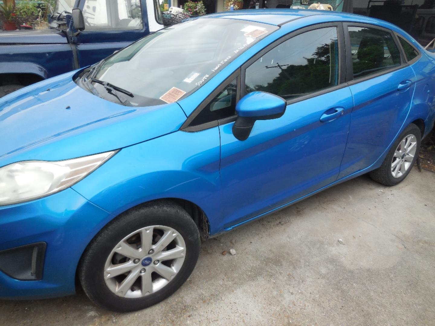 2012 BLUE FORD FIESTA SE Sedan (3FADP4BJ7CM) with an 1.6L L4 DOHC 16V engine, AUTOMATIC transmission, located at 2303 West Mt. Houston, Houston, 77038, (281) 507-3956, 29.771597, -95.339569- Photo#5